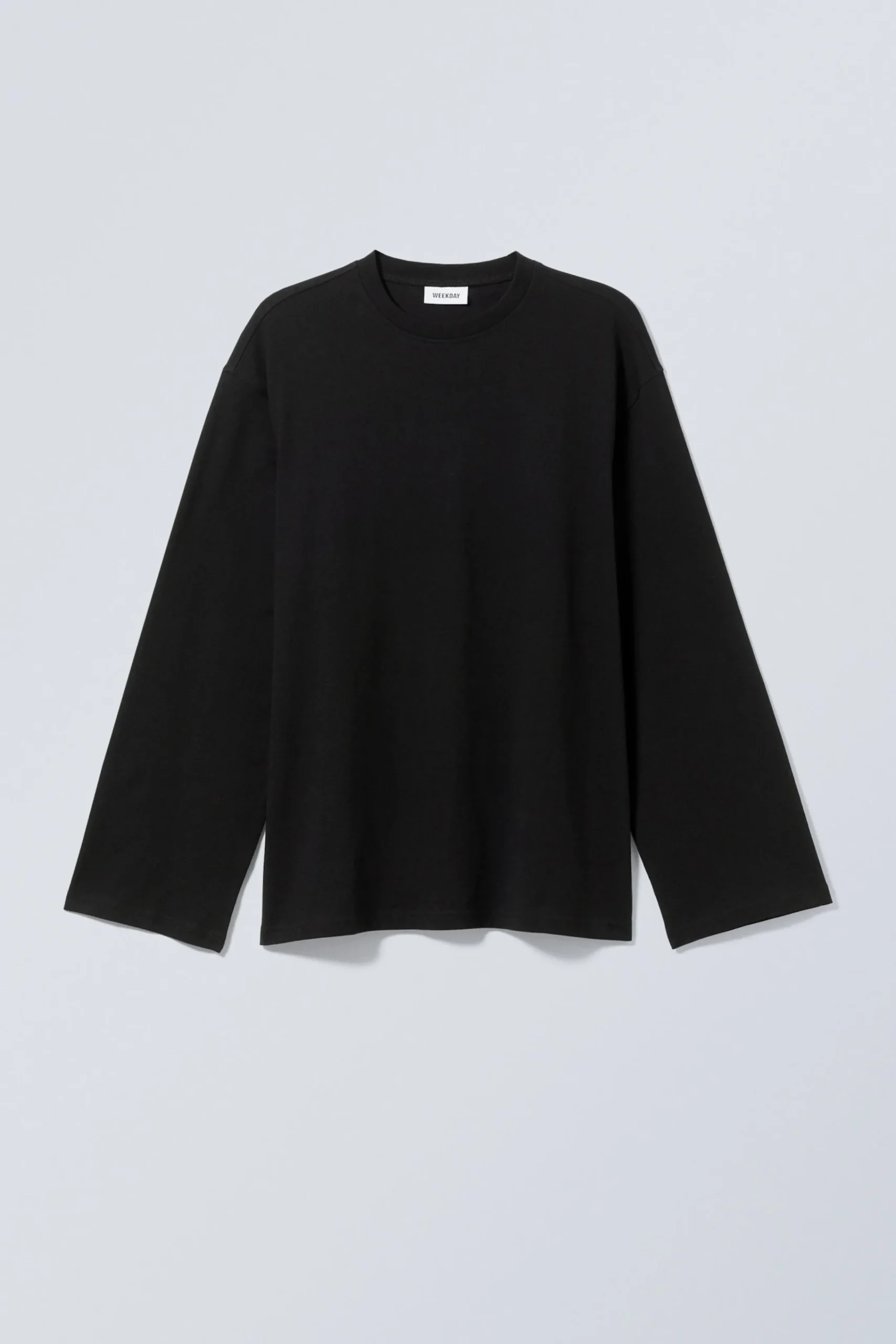 en_oversized_lngrmad_tshirt_2-1.webp Weekday Basplagg | Toppar<EN OVERSIZED LÅNGÄRMAD T-SHIRT