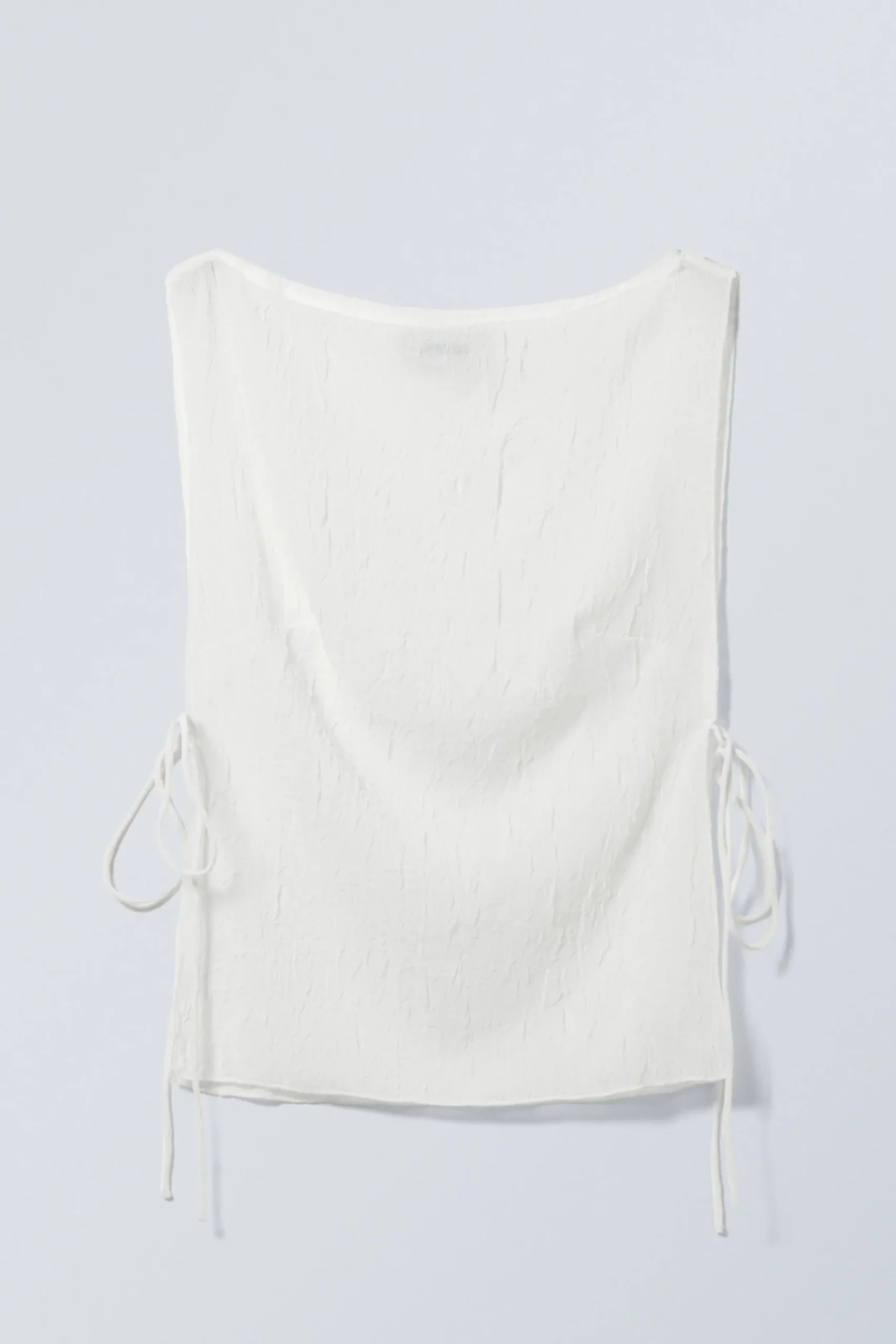 rmls_boatneck_knyttopp_2.webp Weekday Toppar<ÄRMLÖS BOAT-NECK KNYT-TOPP